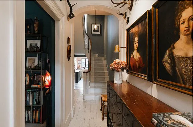 Homeowner Defends All-Black Townhouse Amid Trolls' 'Horrifying' Criticisms, Sparking Debate on Personal Expression vs. Community Aesthetics