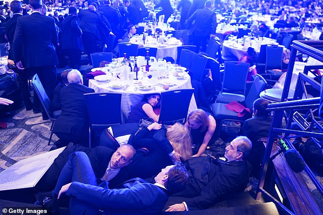 Gunman opens fire at Washington Hilton dinner, sending guests scrambling for cover.
