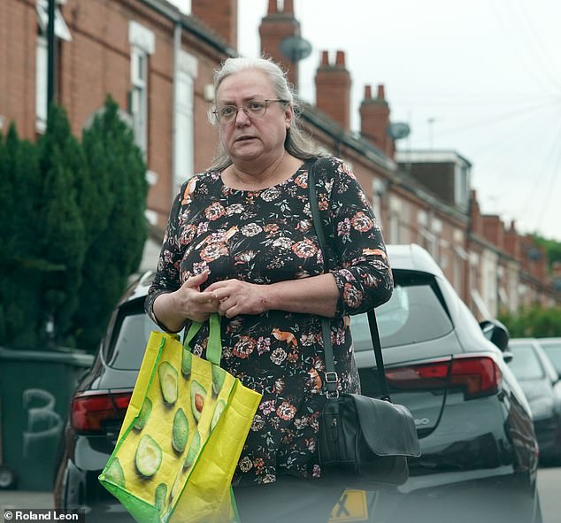 Woman's viral act of trapping a cat in a bin forever changes her life.